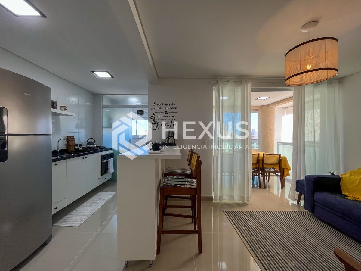 Foto 3 de Apartamento com varanda gourmet e lazer em prédio novo na Praia das Pitangueiras, Guaruja