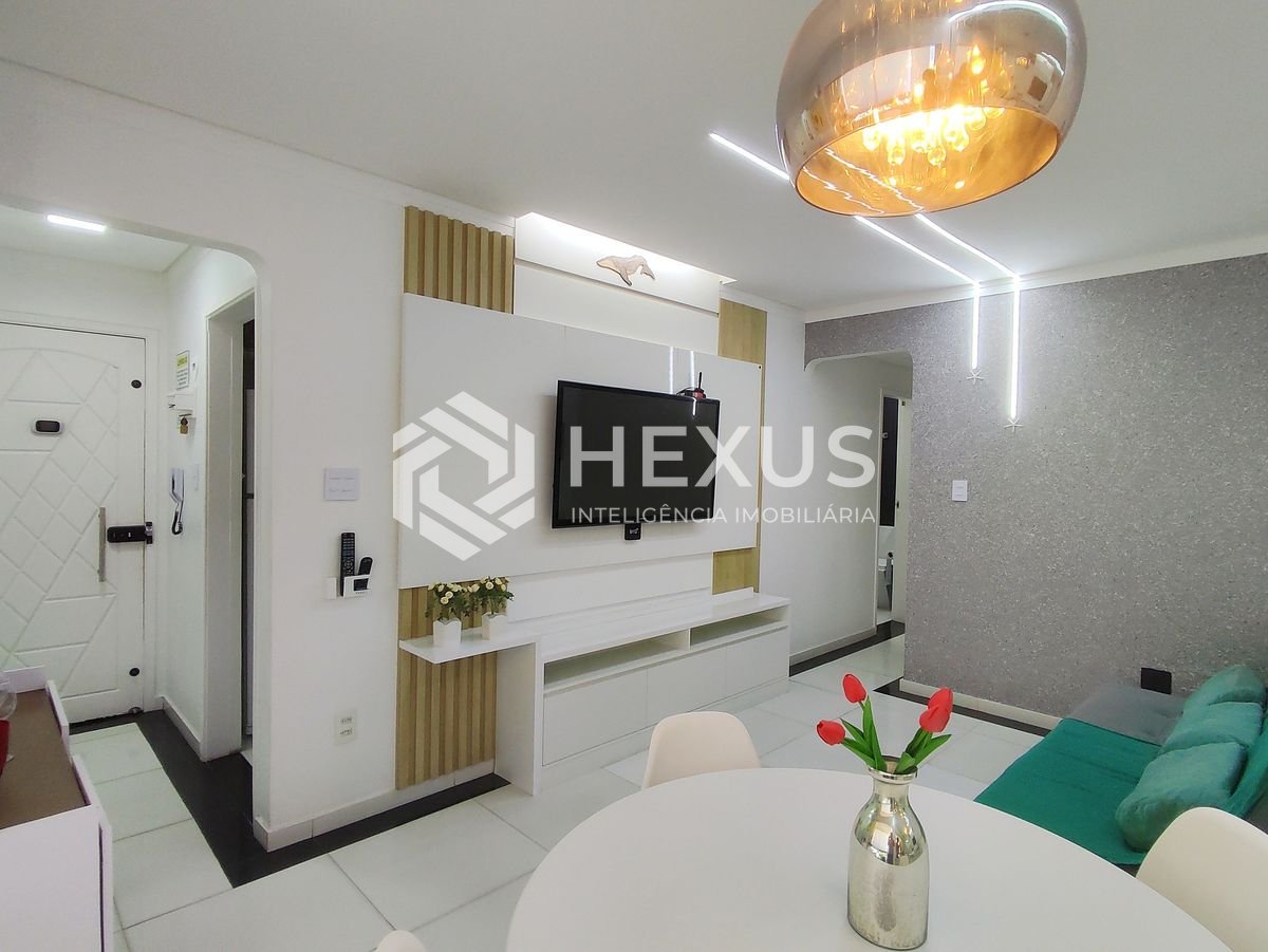 Foto 3 de Apartamento reformado com varanda e lazer na Praia das Astúrias, Guarujá
