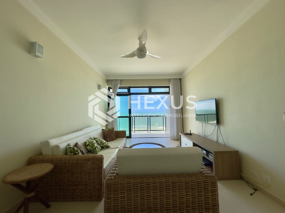 Foto 3 de Apartamento frente mar reformado com varanda e lazer na Praia das Pitangueiras, Guaruja