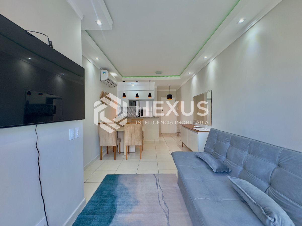 Foto 4 de Apartamento reformado com varanda e lazer na Praia da Enseada, Guaruja