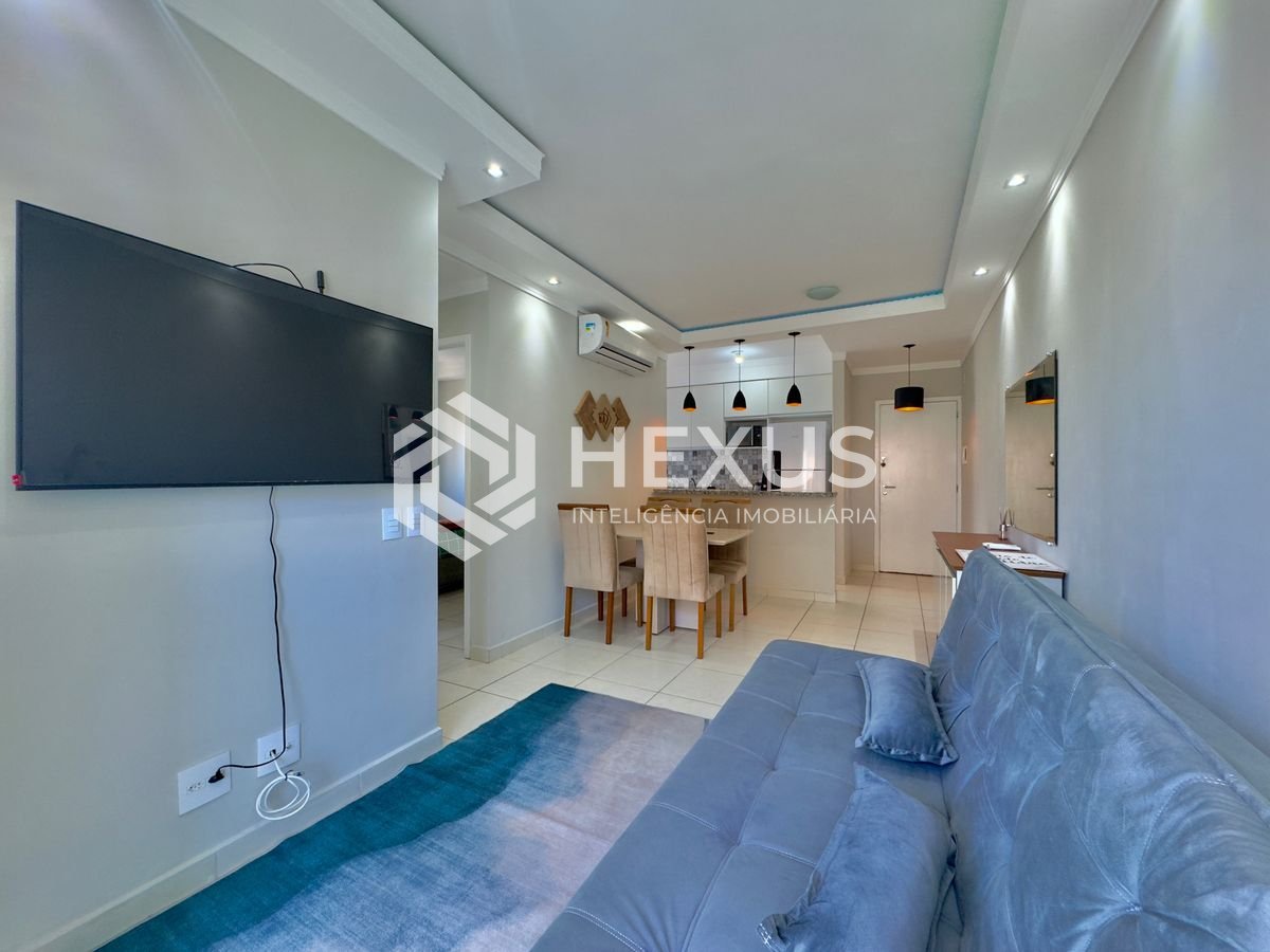 Foto 5 de Apartamento reformado com varanda e lazer na Praia da Enseada, Guaruja