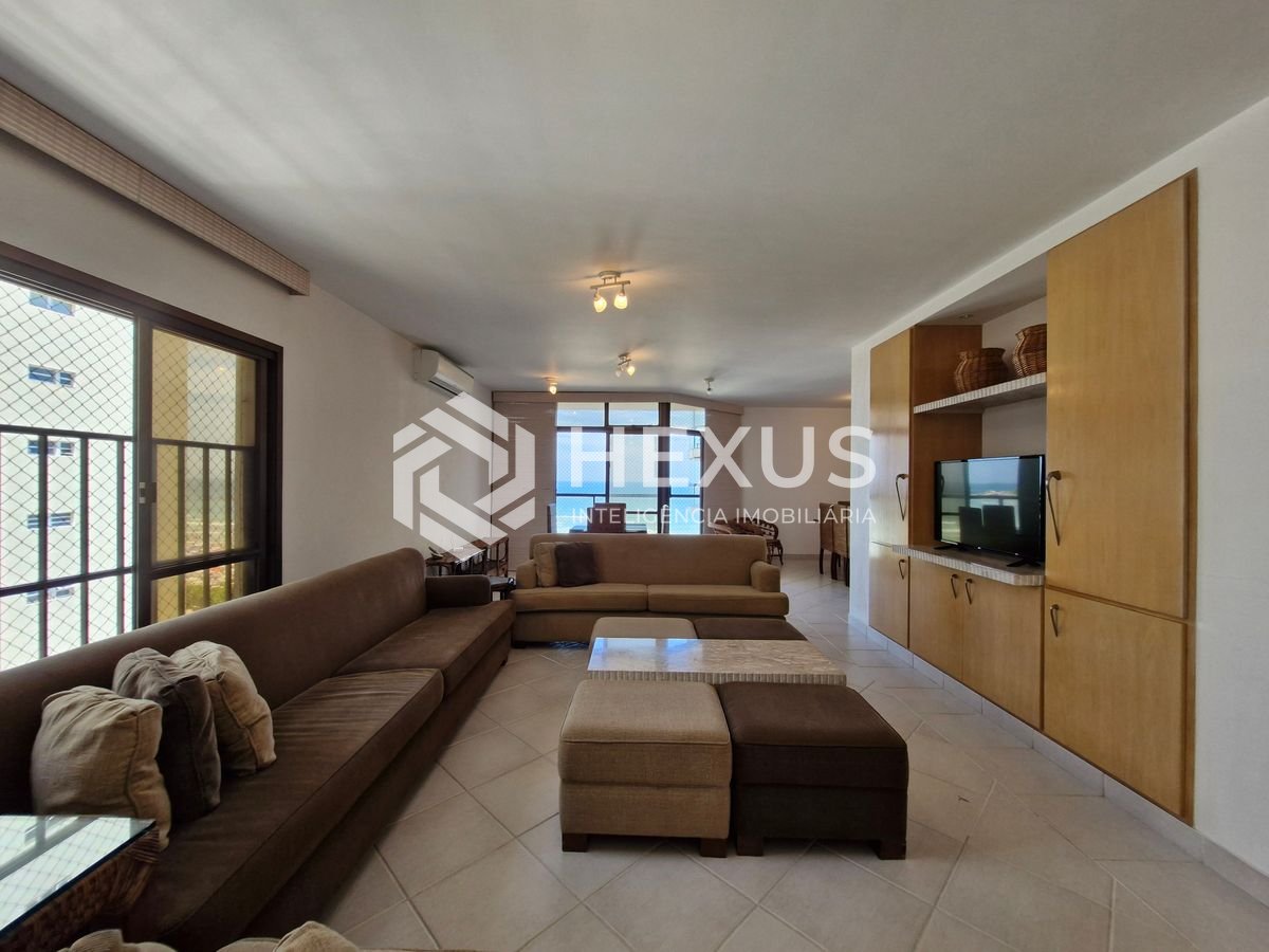 Foto 2 de Apartamento reformado frente mar com varanda e lazer na Praia das Pitangueiras, Guaruja