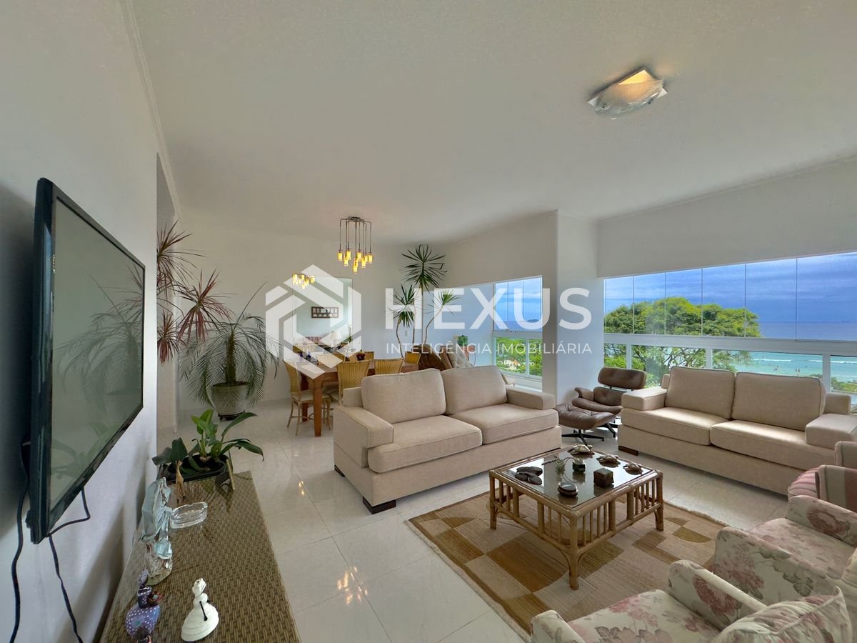 Foto 5 de Apartamento frente mar reformado com varanda e lazer na Praia das Pitangueiras, Guaruja