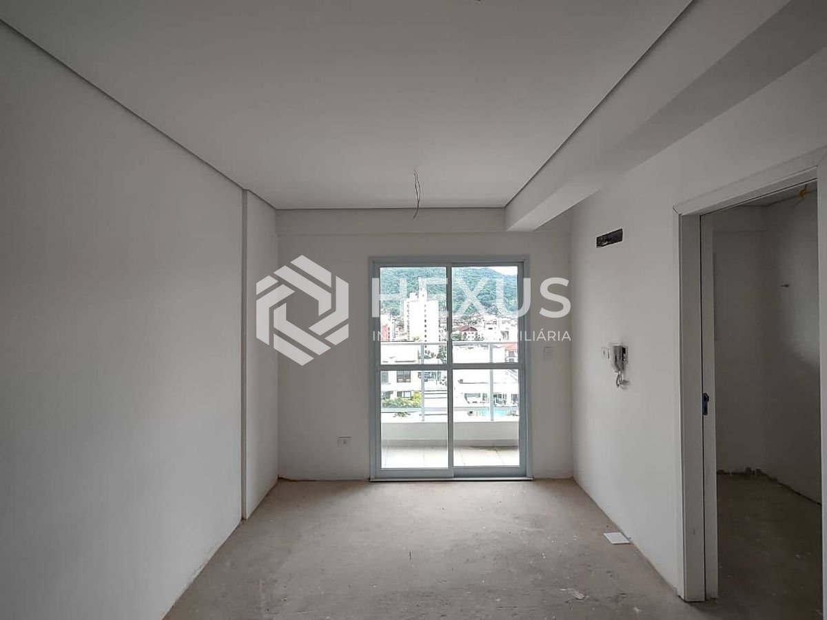 Foto 2 de Apartamento com varanda e lazer na Praia da Enseada, Guaruja