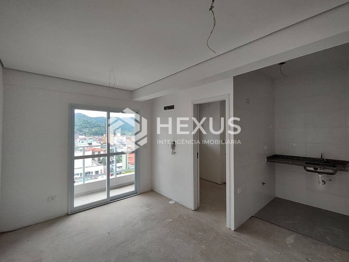 Foto 3 de Apartamento com varanda e lazer na Praia da Enseada, Guaruja