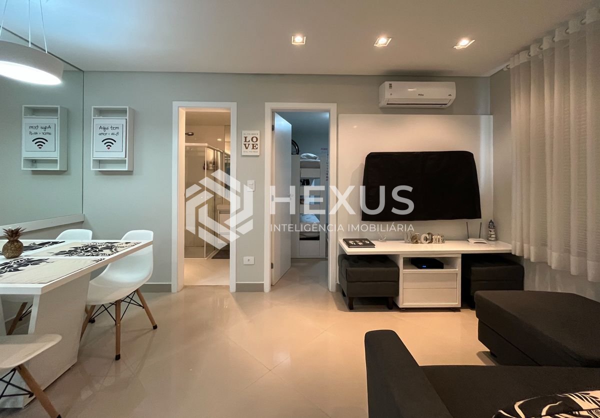 Foto 2 de Apartamento reformado com varanda gourmet e lazer na Praia das Pitangueiras, Guaruja