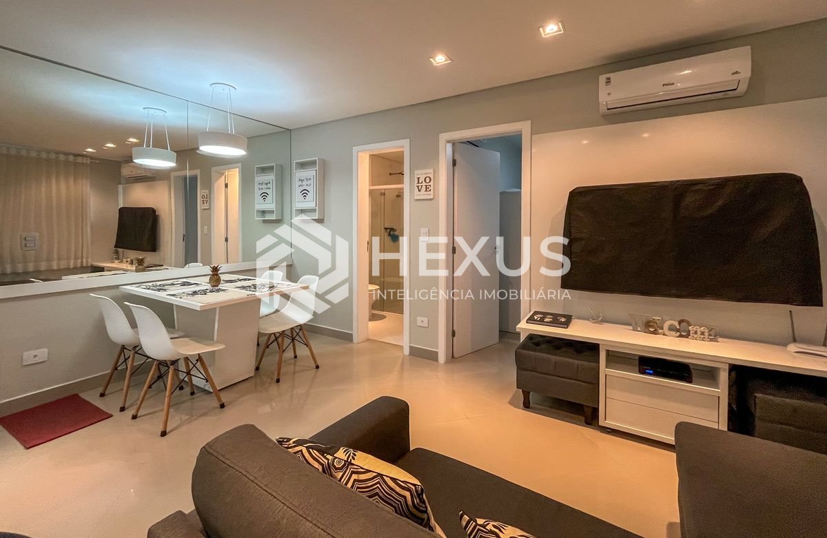 Foto 3 de Apartamento reformado com varanda gourmet e lazer na Praia das Pitangueiras, Guaruja