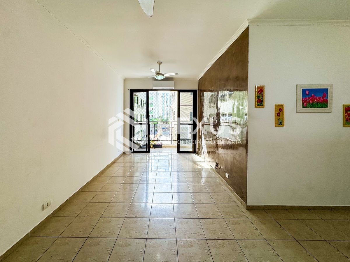 Foto 2 de Apartamento com varanda e despesas baixas na Praia das Asturias, Guaruja