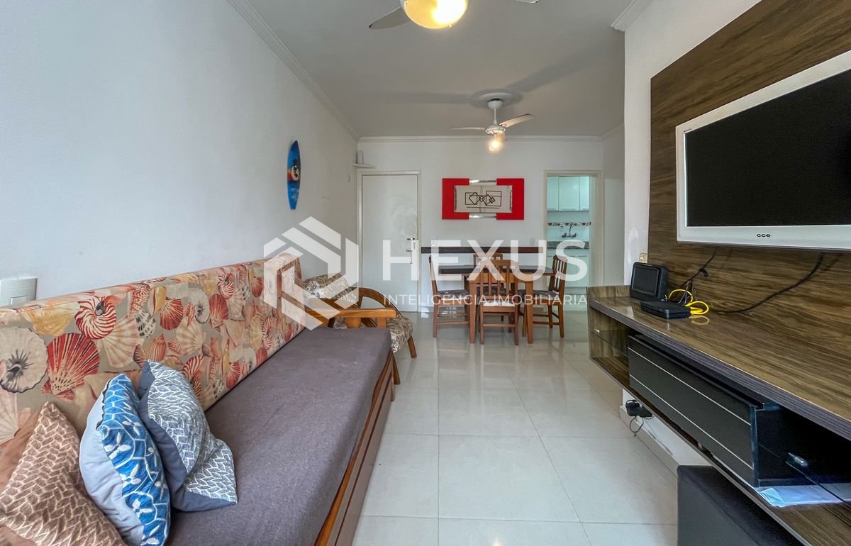Foto 4 de Apartamento reformado com varanda a uma quadra da praia em Pitangueiras, Guarujá