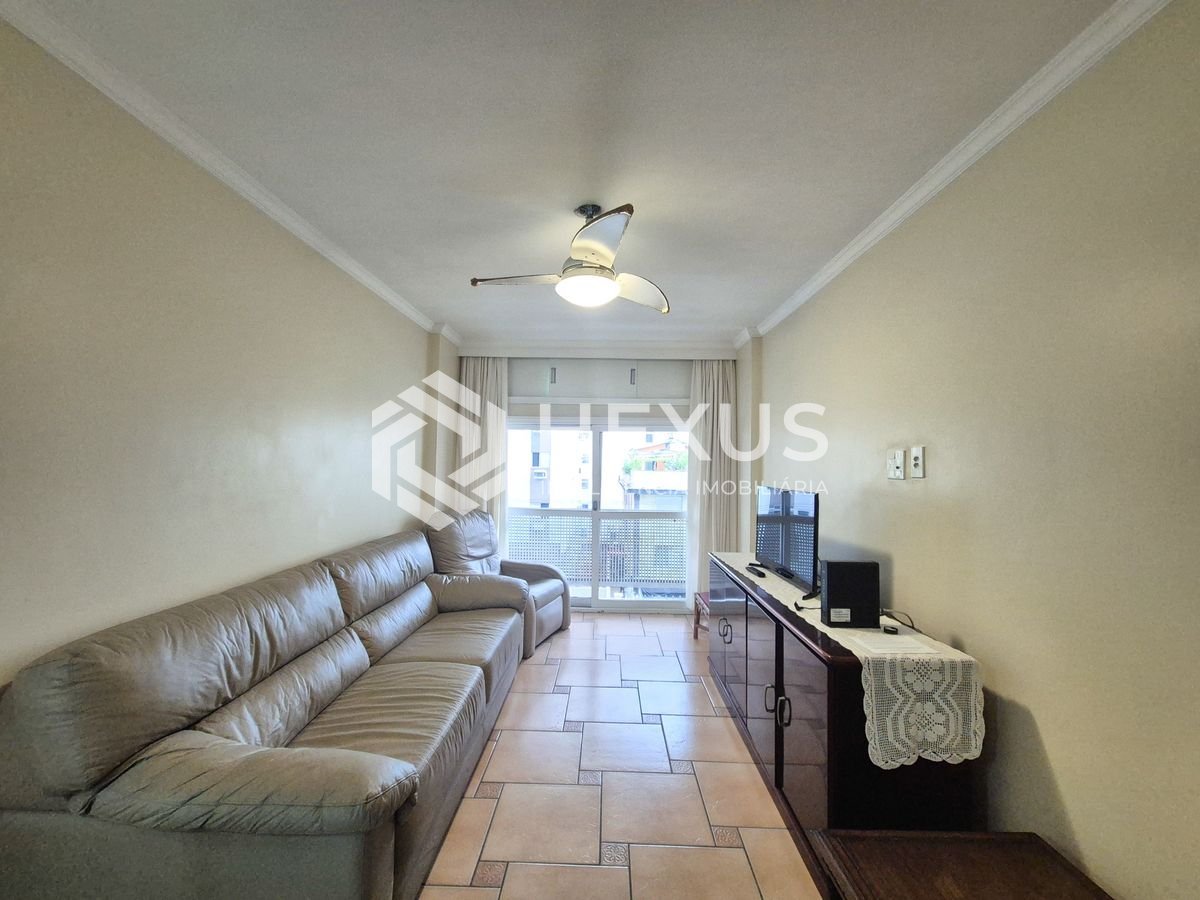 Foto 2 de Apartamento com varanda a 1 quadra da praia nas Pitangueiras, Guarujá