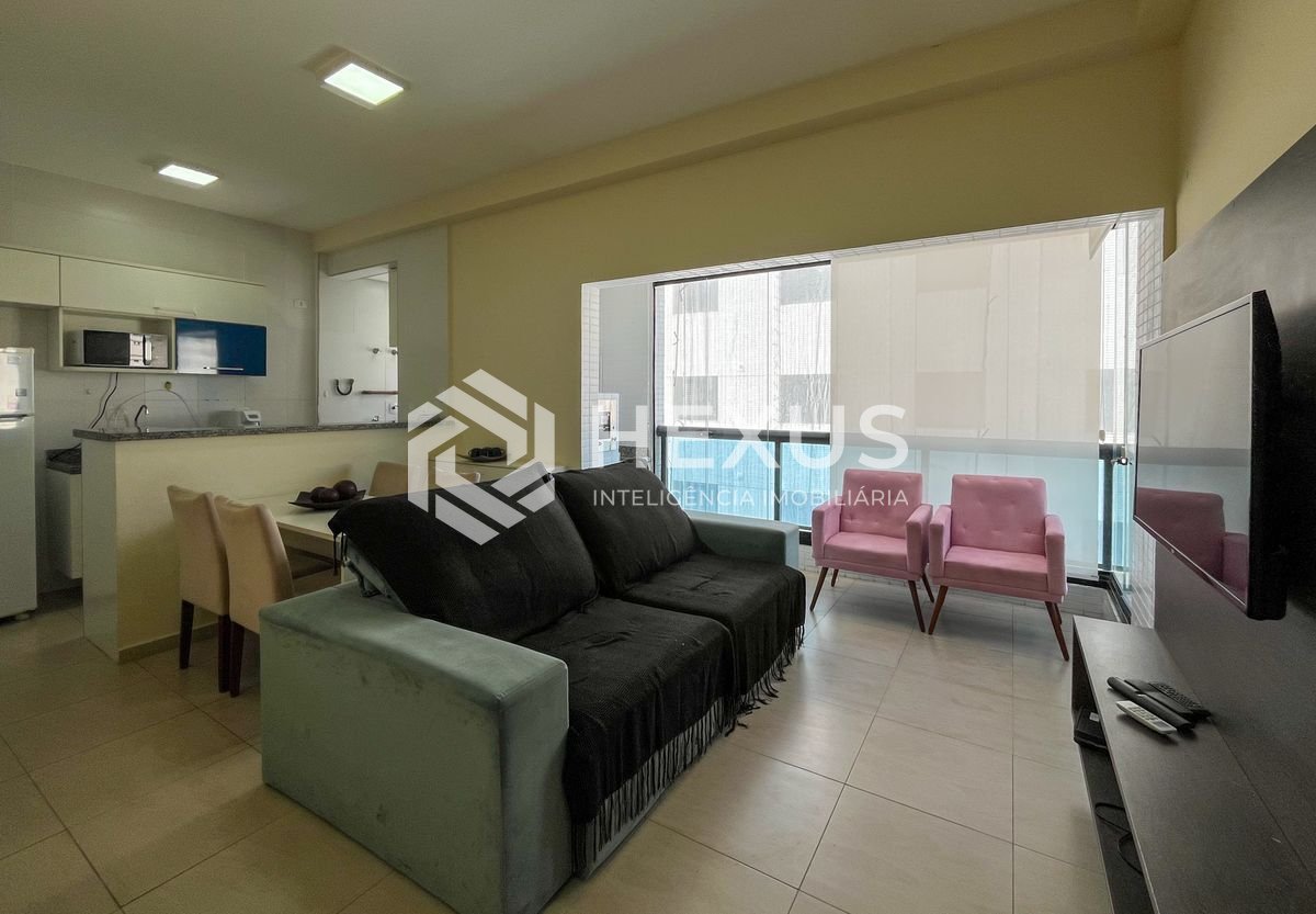 Foto 3 de Flat reformado com varanda gourmet e lazer na Pitangueiras, Guarujá