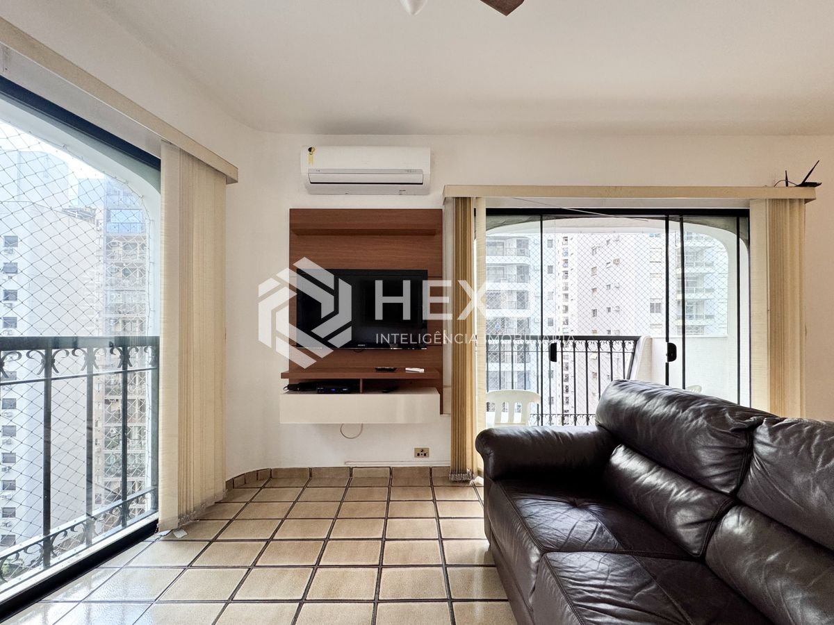 Foto 3 de Apartamento com varanda e lazer a 240m da praia nas Pitangueiras, Guarujá