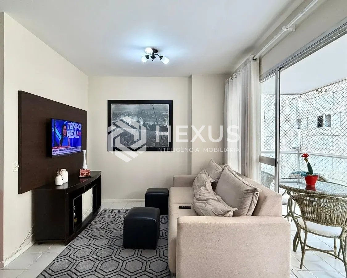 Foto 2 de Apartamento com varanda e lazer a 100m da praia nas Pitangueiras, Guarujá