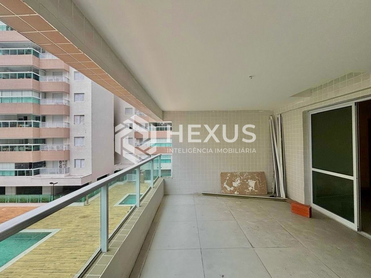 Foto 3 de Apartamento reformado com varanda gourmet vista mar com lazer a 1 quadra da praia no Jardim Astúrias à venda, Guarujá-SP.