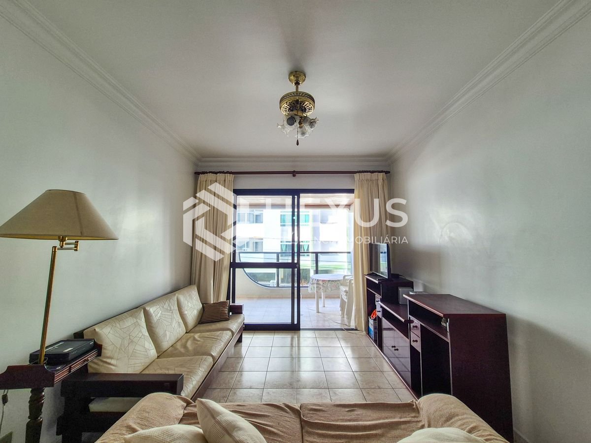 Foto 2 de Apartamento com varanda e lazer a 1 quadra da praia nas Pitangueiras, Guarujá