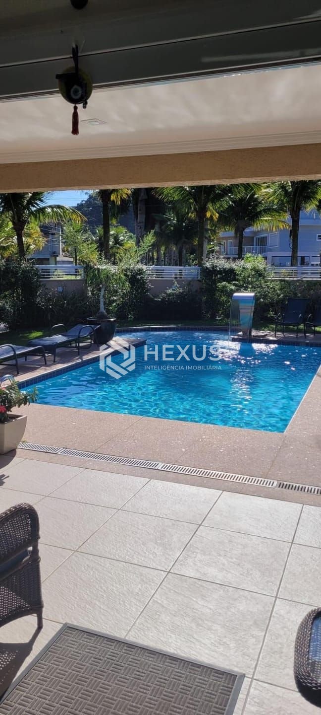 Foto 3 de Casa reformada com piscina e área gourmet no Jardim Pernambuco I, Guaruja