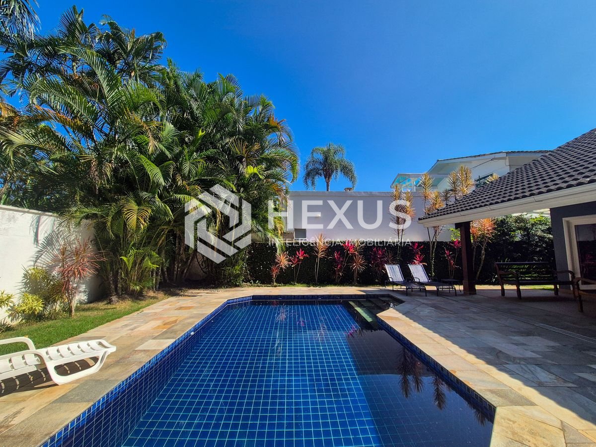 Foto 4 de Casa reformada com varanda e lazer em Jardim Pernambuco I, Guarujá