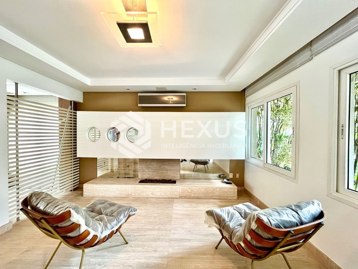 Foto 5 de Casa reformada com piscina e área gourmet no Jardim Pernambuco I, Guarujá