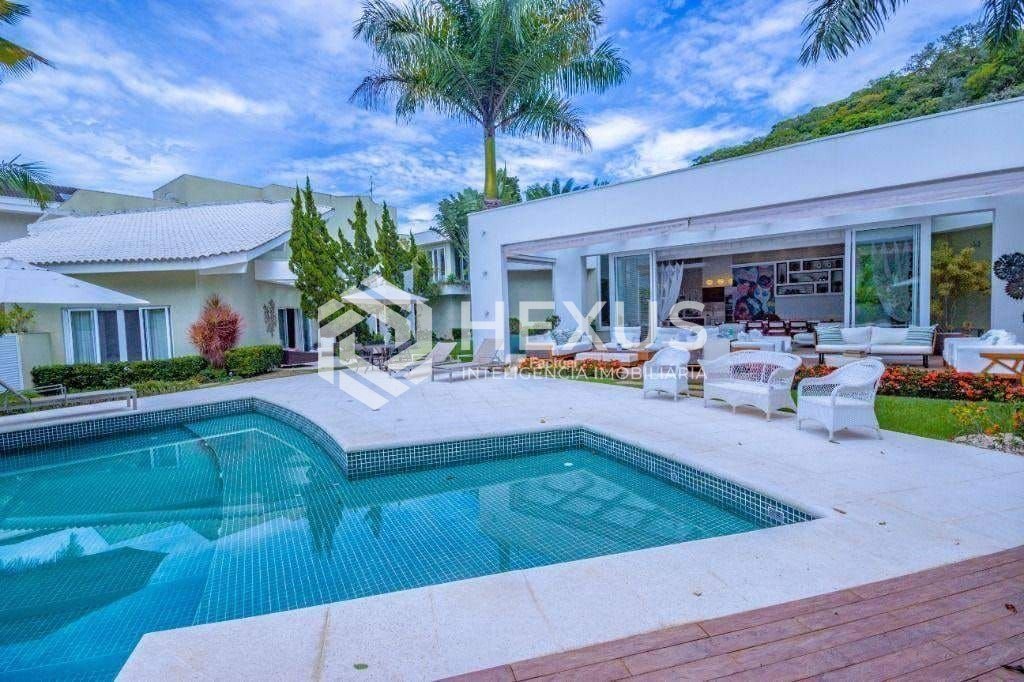 Foto 5 de Casa reformada com varanda gourmet e piscina no Jardim Pernambuco I, Guarujá