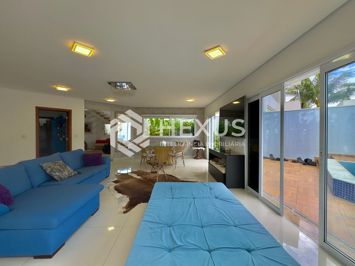 Foto 4 de Casa reformada com piscina e área gourmet no Condomínio Jardim Acapulco, Guaruja