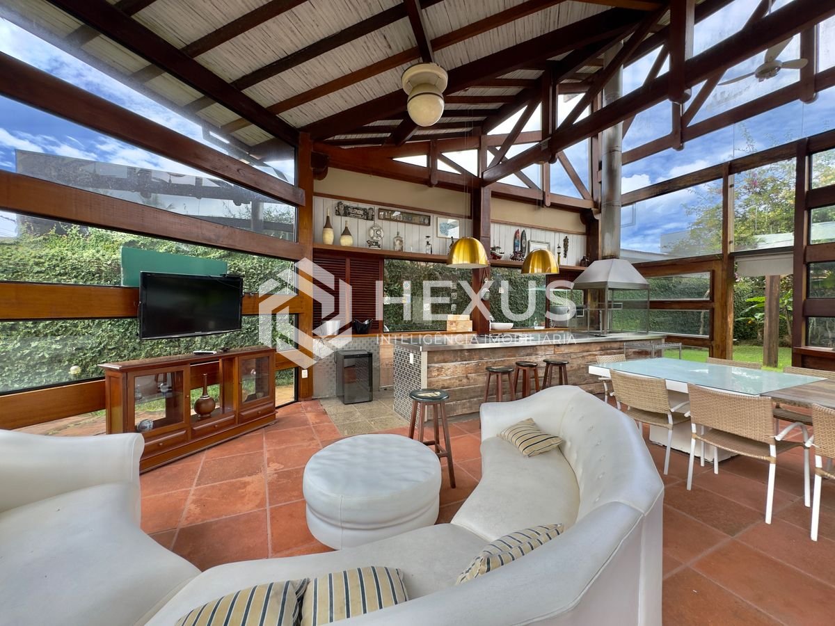 Foto 4 de Casa Rústica com piscina e área gourmet no Jardim Acapulco, Guaruja