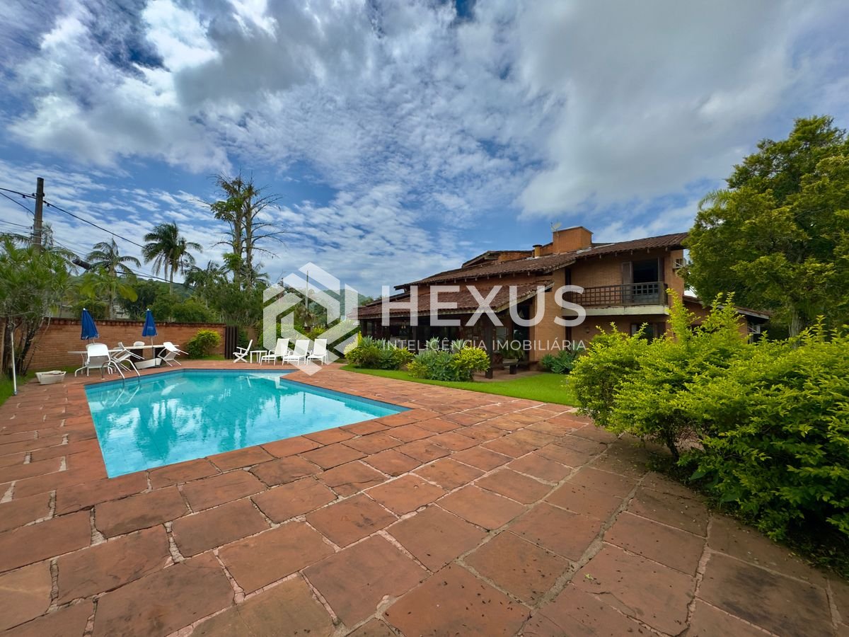 Foto 5 de Casa Rústica com piscina e área gourmet no Jardim Acapulco, Guaruja