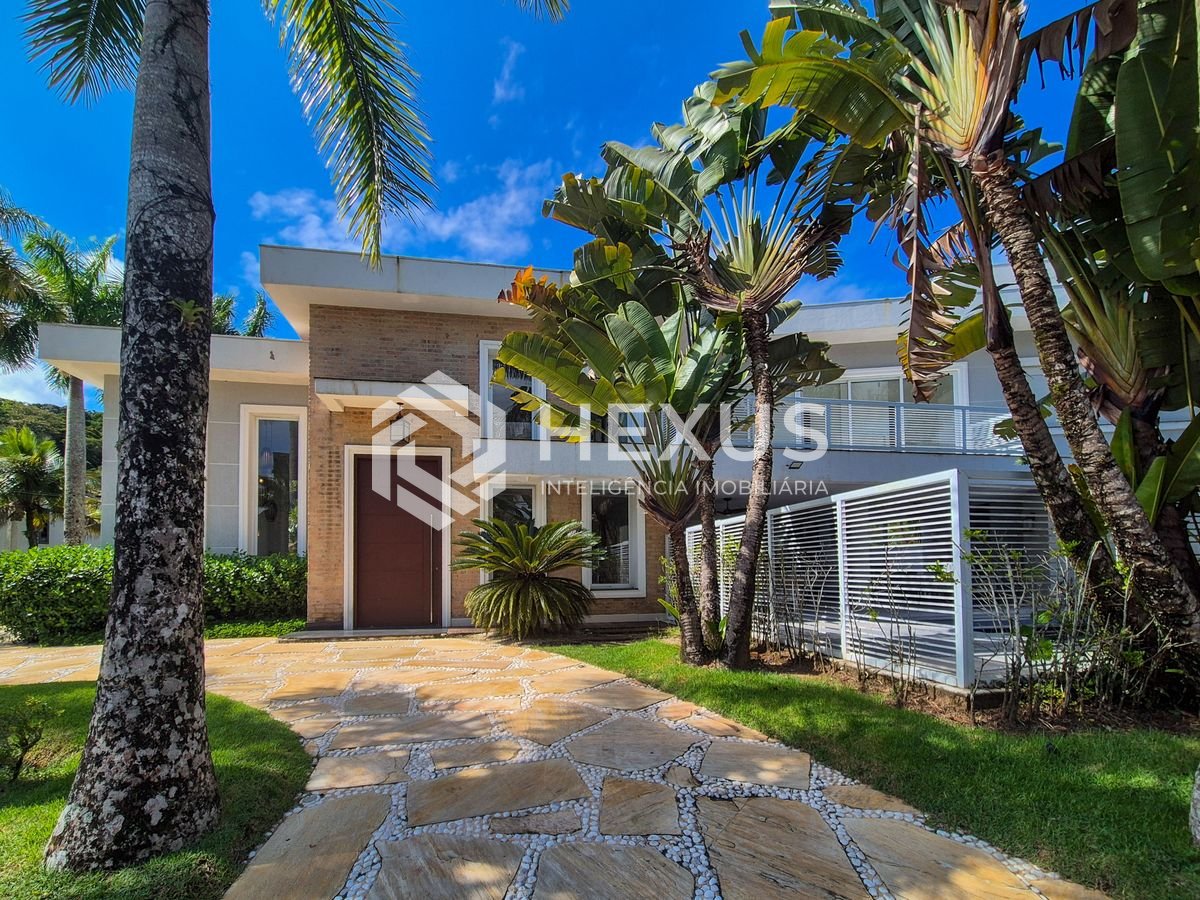 Foto 3 de Casa reformada com piscina e área gourmet no Jardim Pernambuco I, Guarujá