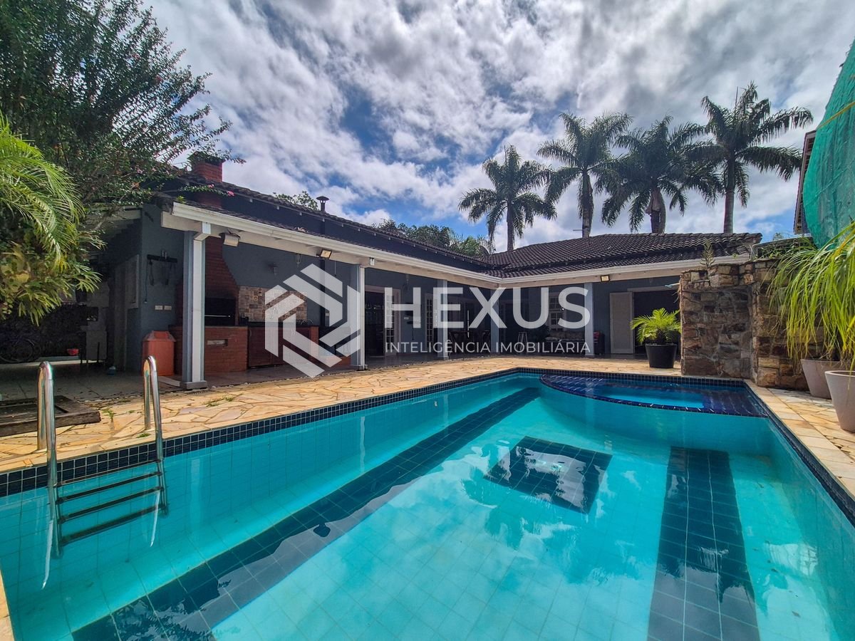 Foto 3 de Casa térrea com piscina e área gourmet no Jardim Pernambuco I, Guarujá