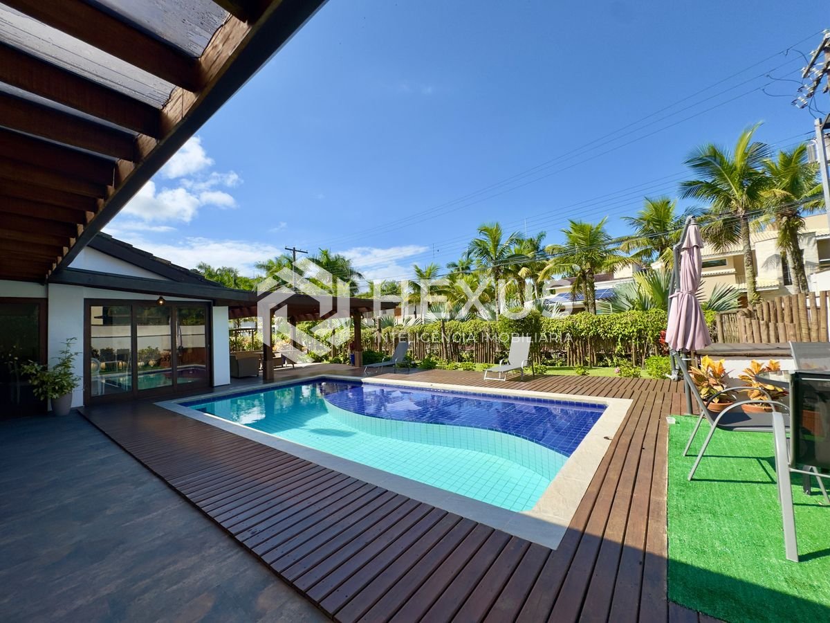 Foto 3 de Casa reformada com piscina e área gourmet no Jardim Pernambuco I, Guarujá
