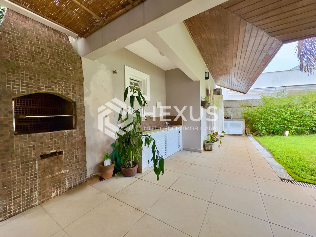 Foto 3 de Casa térrea com piscina e área gourmet no Jardim Pernambuco I, Guarujá