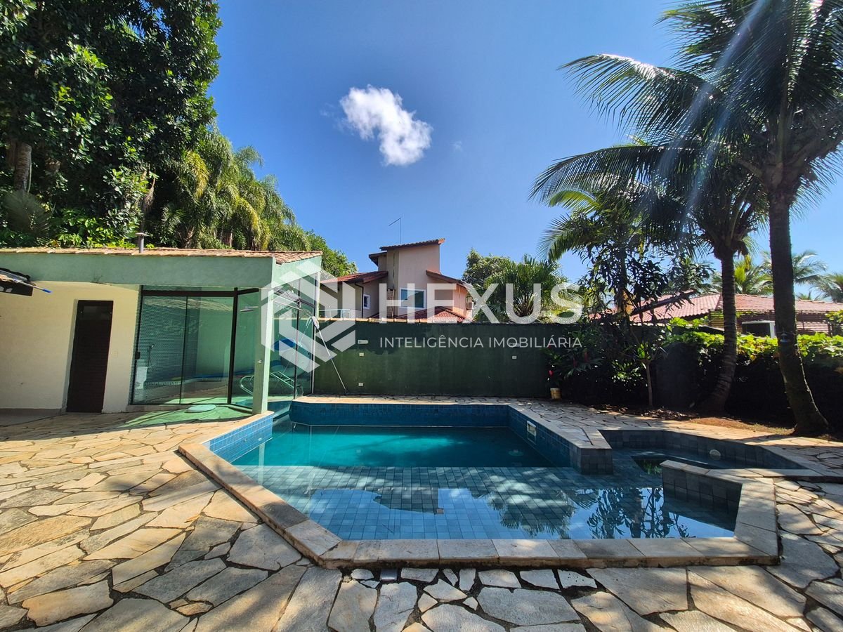 Foto 4 de Casa reformada com piscina e árae gourmet no Jardim Pernambuco II, Guarujá