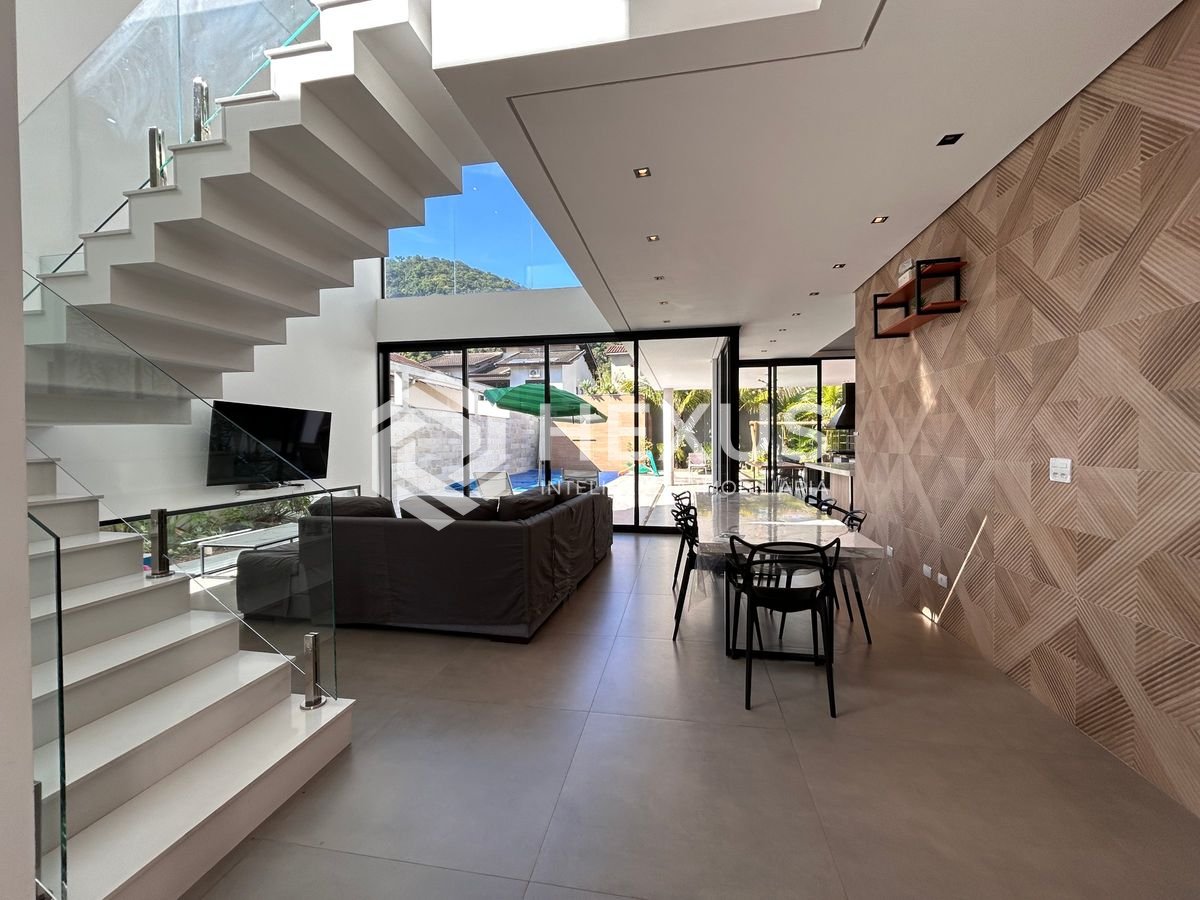 Foto 5 de Casa de alto padrão com 4 suítes e piscina área gourmet no Jardim Pernambuco, Guarujá