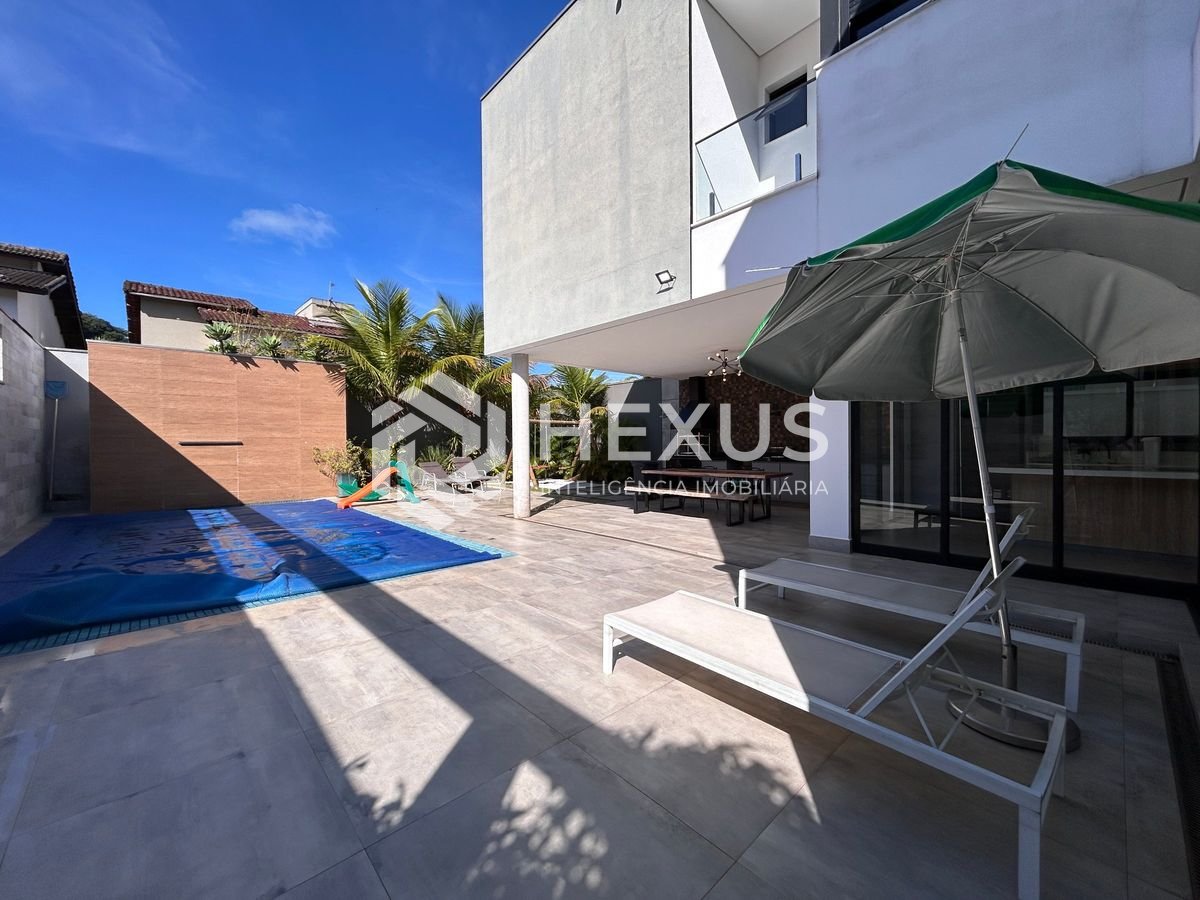 Foto 3 de Casa de alto padrão com 4 suítes e piscina área gourmet no Jardim Pernambuco, Guarujá
