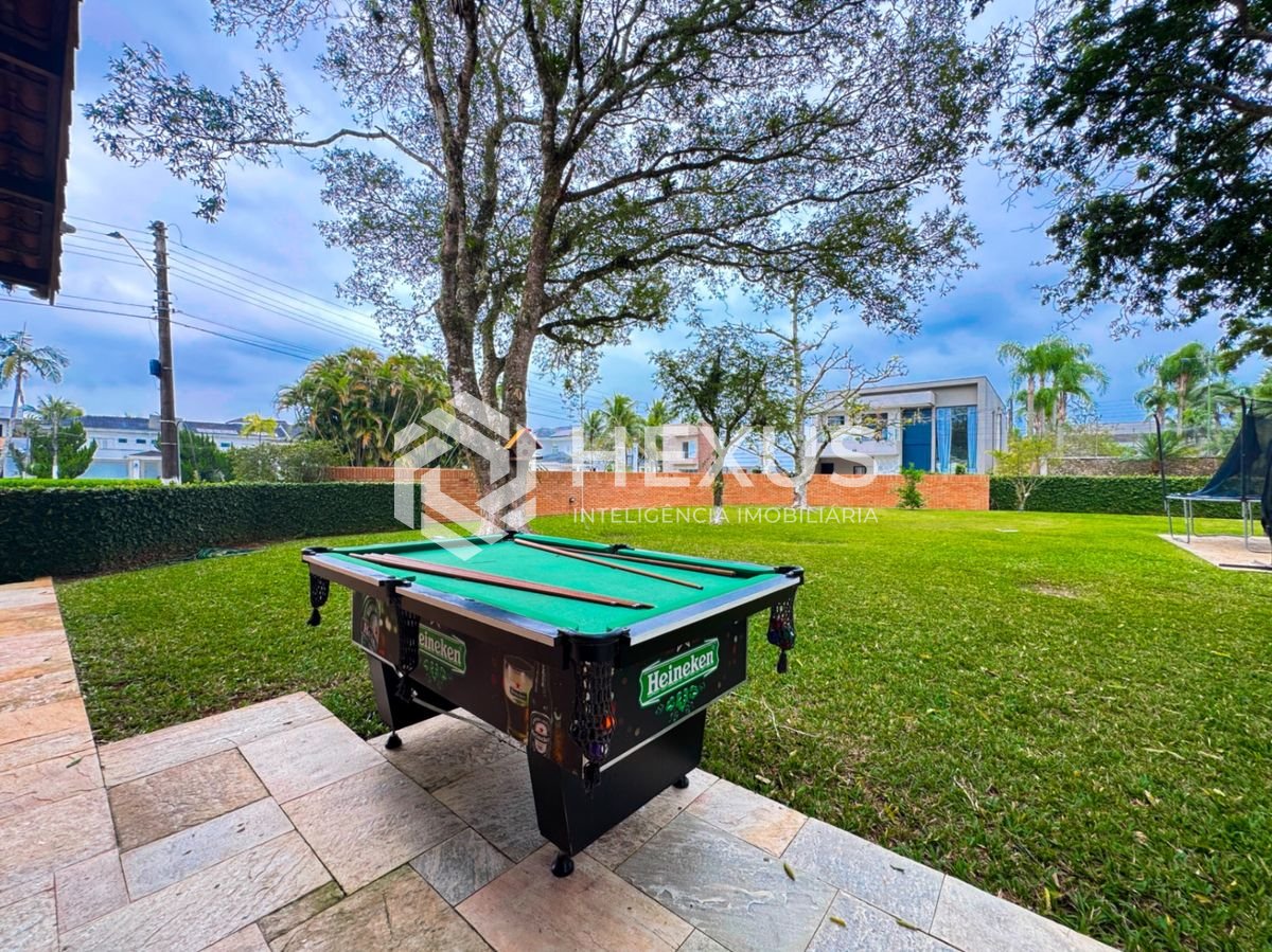 Foto 4 de Casa de alto padrão com piscina e área gourmet no Jardim Acapulco, Guarujá
