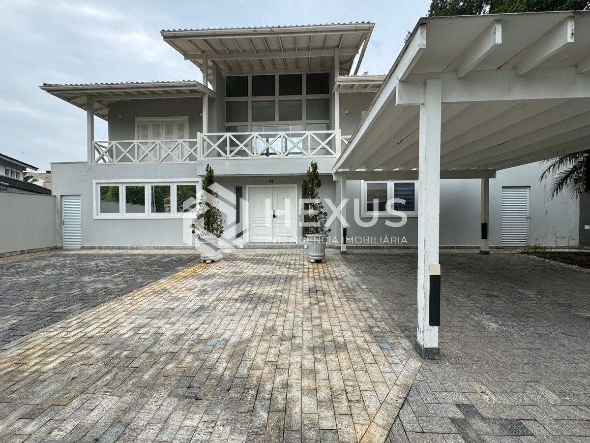 Foto 5 de Casa reformada com piscina e área gourmet no Jardim Pernambuco I, Guarujá