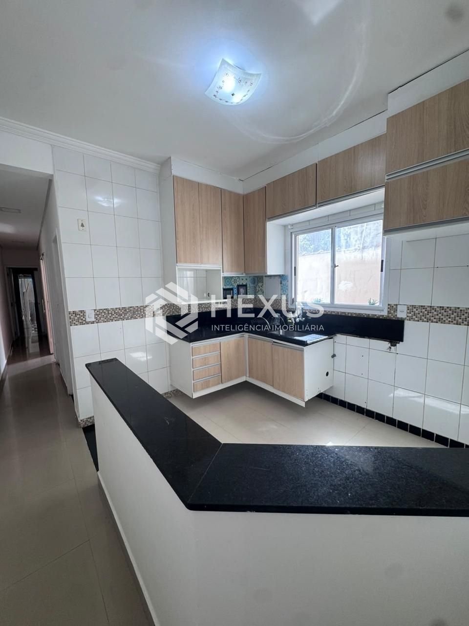 Foto 4 de Casa com piscina e área gourmet em Vila Santo Antônio, Guarujá