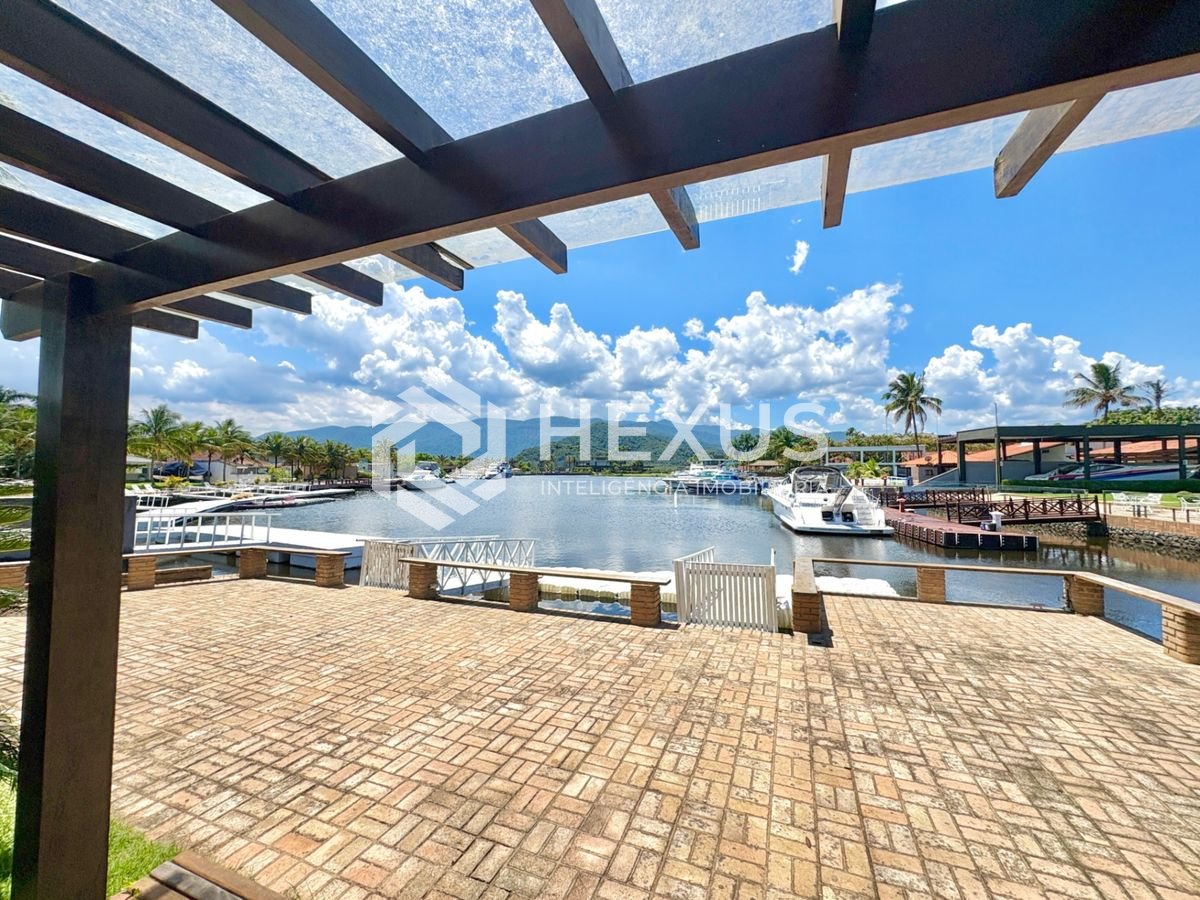 Foto 3 de Casa com pier  e área gourmet no Residencial Marina Guarujá