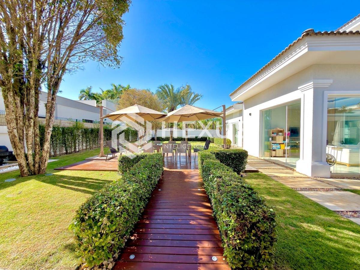 Foto 4 de Casa reformada com piscina e área gourmet no Jardim Acapulco, Guarujá