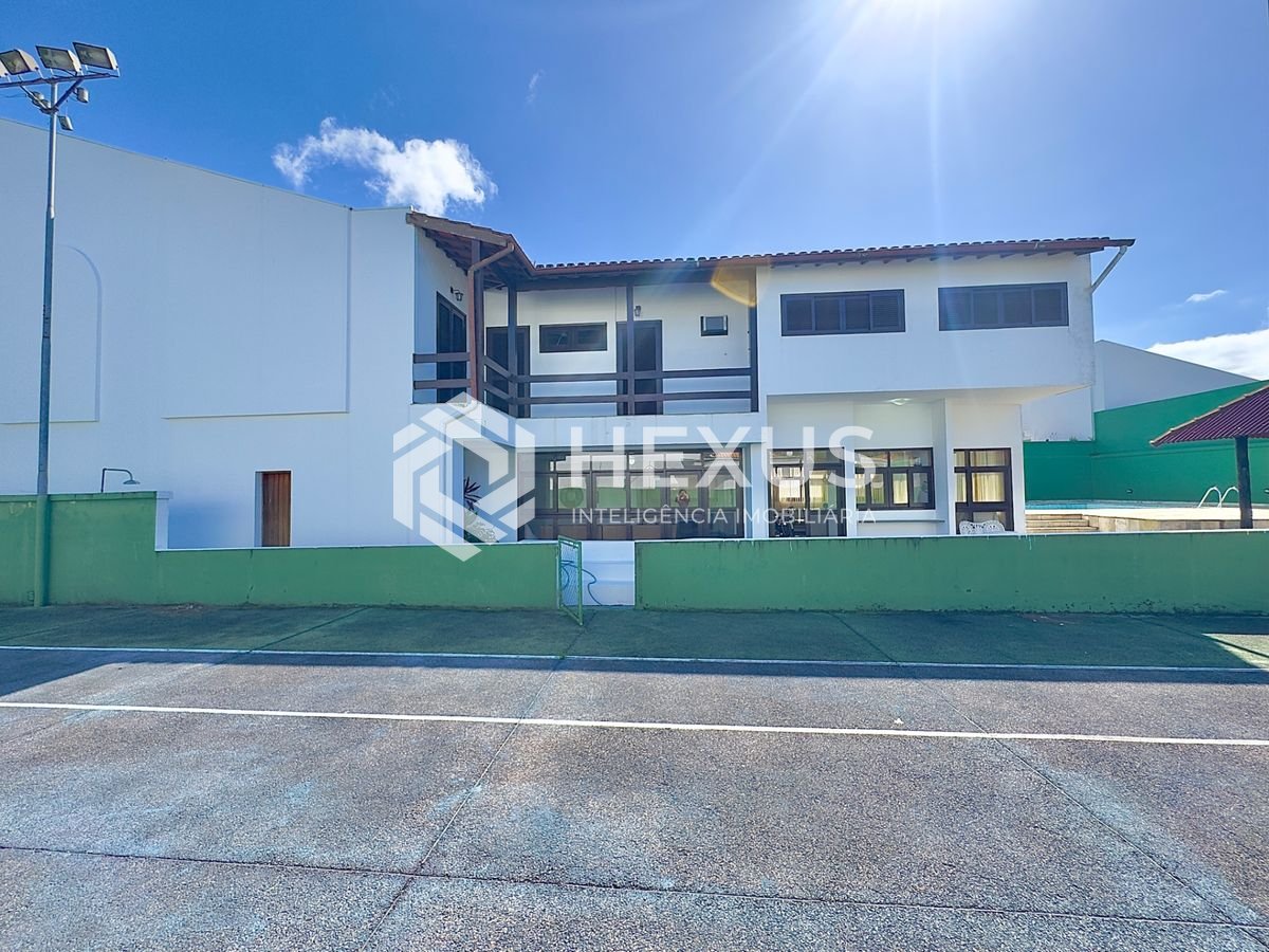 Foto 4 de Casa reformada com piscina e área gourmet no Jardim Acapulco, Guarujá