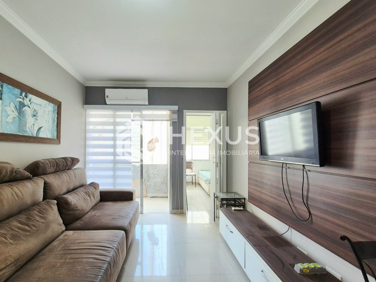Foto 2 de Apartamento reformado com varanda a 2 quadras da praia na região da Barra Funda nas Pitangueiras, Guarujá