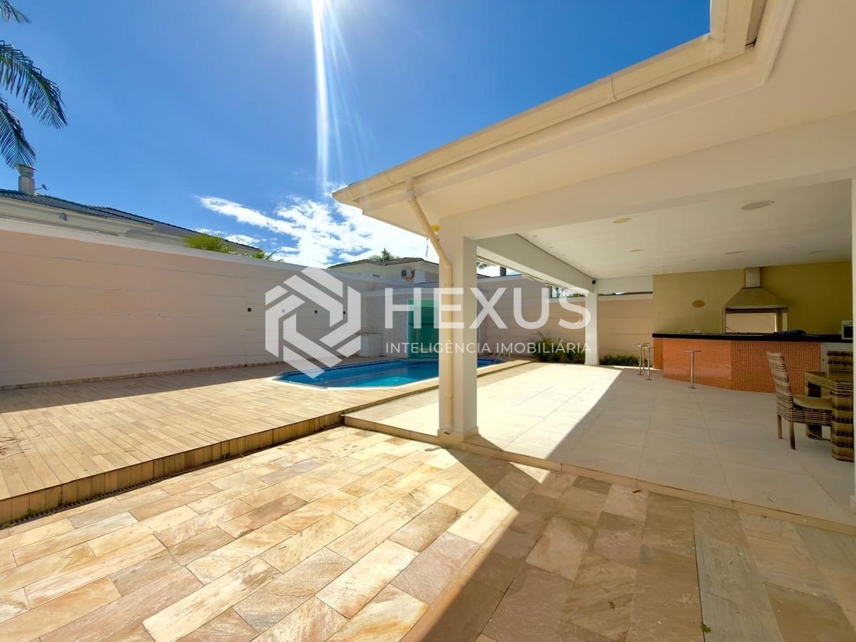 Foto 3 de Casa de alto padrão com piscina e área gourmet no Jardim Acapulco, Guarujá