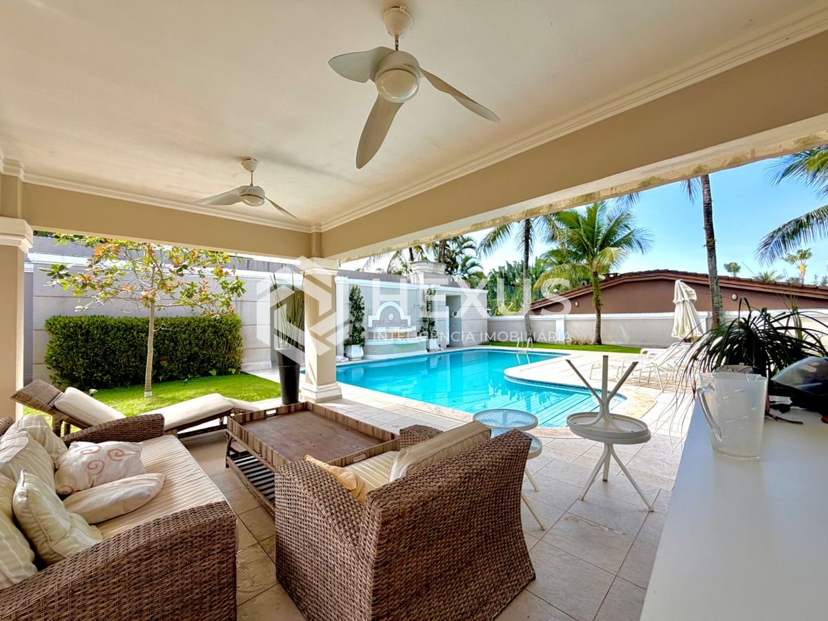 Foto 4 de Casa com piscina e área gourmet no Condomínio Jardim Acapulco no Pernambuco, Guarujá