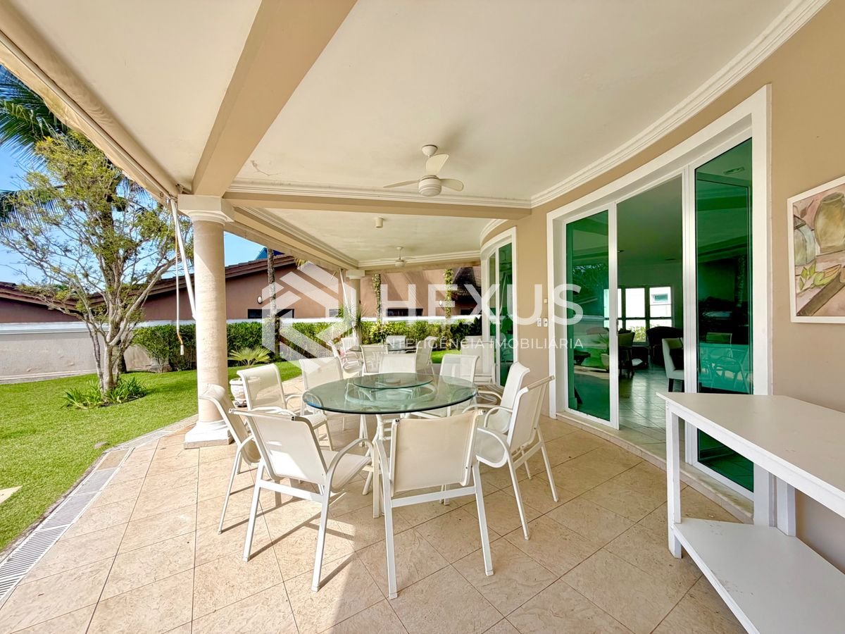 Foto 5 de Casa com piscina e área gourmet no Condomínio Jardim Acapulco no Pernambuco, Guarujá