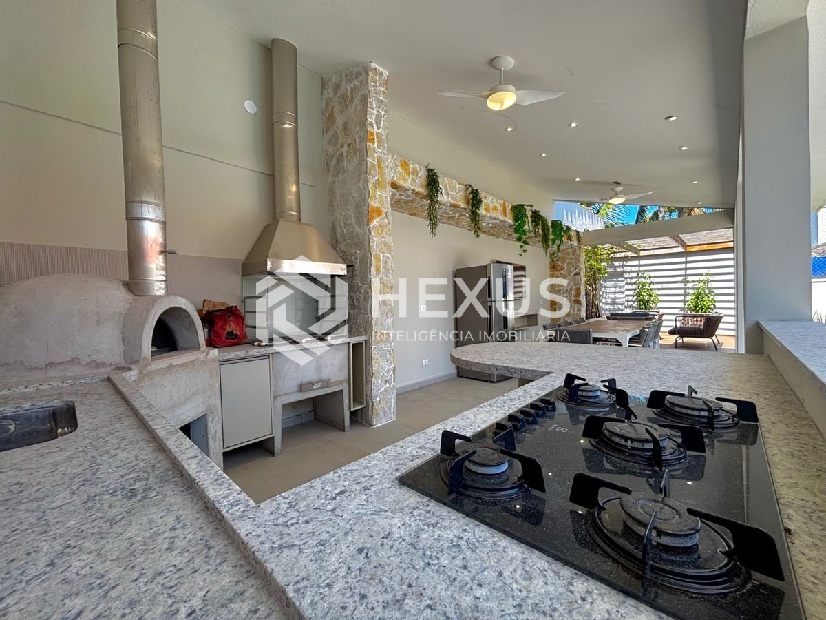 Foto 5 de Casa reformada com piscina e área gourmet no Jardim Acapulco, Guarujá