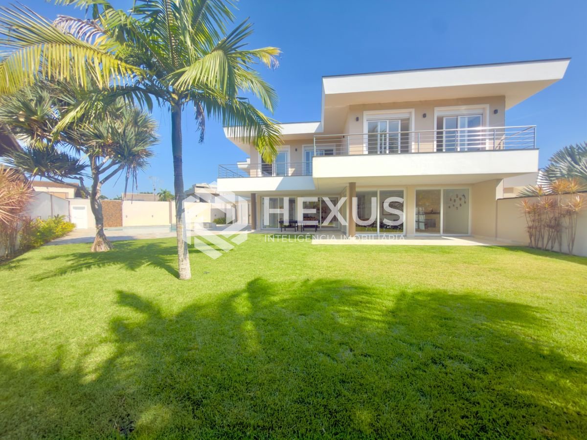 Foto 5 de Casa de alto padrão com piscina e área gourmet no Jardim Acapulco, Guarujá.