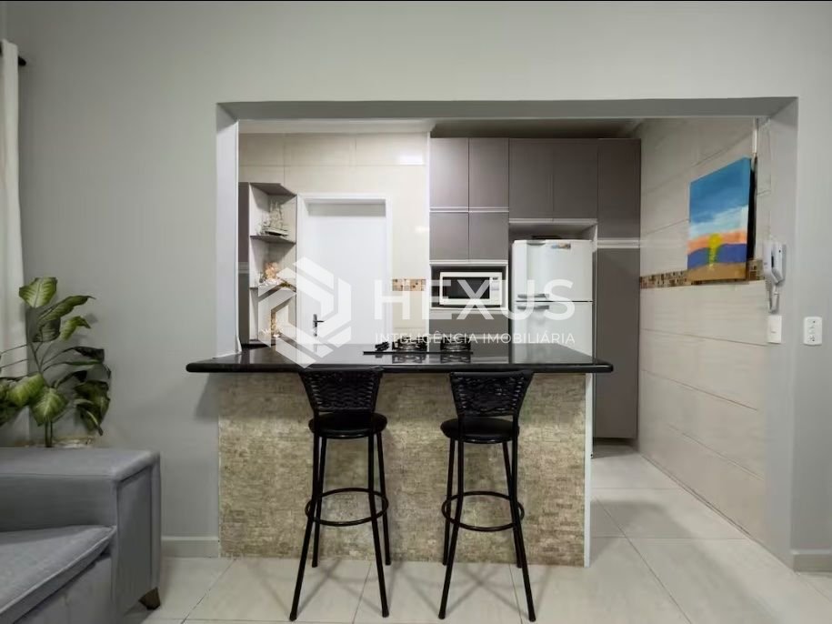 Foto 4 de Apartamento reformado a 200m da praia na região da Brunella na Enseada, Guarujá
