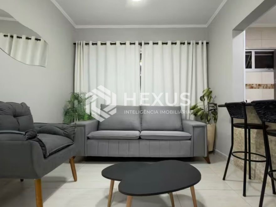 Foto 3 de Apartamento reformado a 200m da praia na região da Brunella na Enseada, Guarujá