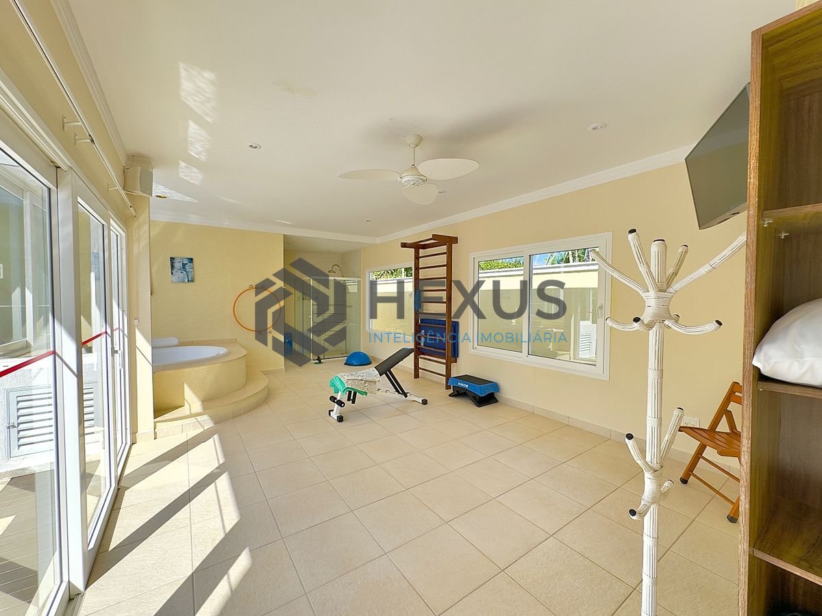 Foto 19 de Casa reformada com piscina e área gourmet no Jardim Acapulco, Guarujá