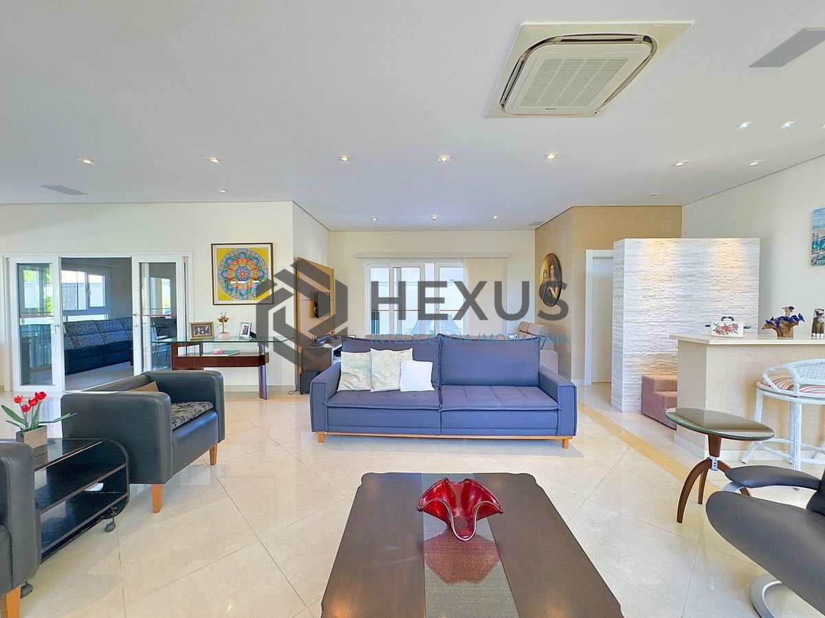 Foto 9 de Casa reformada com piscina e área gourmet no Jardim Acapulco, Guarujá