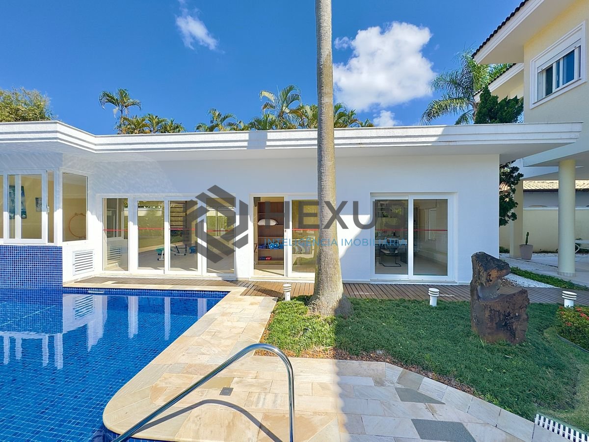 Foto 18 de Casa reformada com piscina e área gourmet no Jardim Acapulco, Guarujá